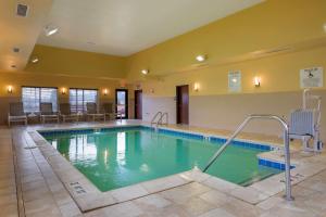a large swimming pool in a hotel room at Best Western Plus French Lick in French Lick