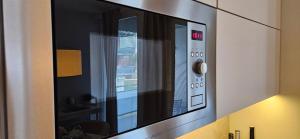 Kuchyň nebo kuchyňský kout v ubytování Apartment Holata 201