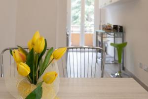 A kitchen or kitchenette at M.G Home a un passo da tutto