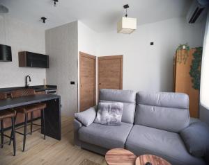 a living room with a couch and a table at Casa Luna in Brunete