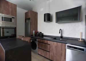 a kitchen with a sink and a counter top at Casa Luna in Brunete