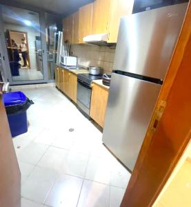 Kuchyň nebo kuchyňský kout v ubytování Deluxe Couple Partition Room in Tecom Near Metro + 18 fotografií