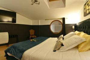 Katil atau katil-katil dalam bilik di Le Patio Moonlove : ambiance Zen SPA et Sauna