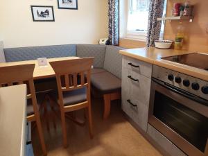 Kuchyň nebo kuchyňský kout v ubytování Appartement Genigau + 17 fotografií