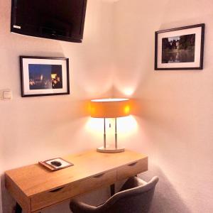TV o dispositivi per l'intrattenimento presso Hotel Auberge Rustique