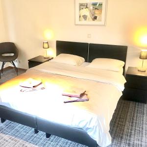 Letto o letti in una camera di Hotel Auberge Rustique