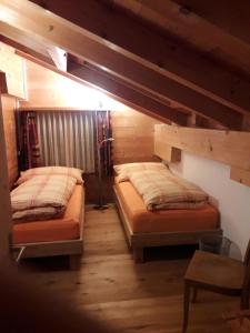 Postel nebo postele na pokoji v ubytování Beat & Ursula's Guest House