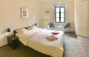 Letto o letti in una camera di Hotel Auberge Rustique