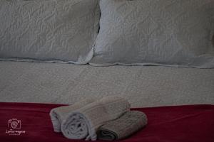 Ένα ή περισσότερα κρεβάτια σε δωμάτιο στο pousada pé na areia