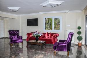 TV in/ali zabaviščno središče v nastanitvi Uzunhan Hotel
