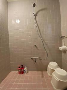 a bathroom with a shower and a toilet at SlowTime - Vacation STAY 75364v in Shima