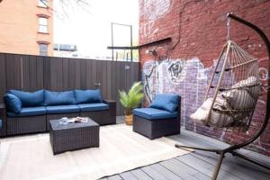 a patio with a swing and a hammock at 3BR 2Baths with Private Outdoors in New York