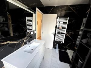 Ванная комната в Appartement lumineux en centre-ville / Proche Gare