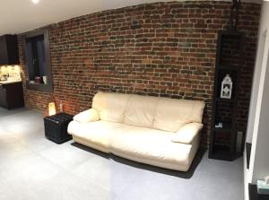 Χώρος καθιστικού στο Duplex style industriel à deux pas de la Place