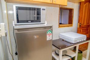 Η κουζίνα ή μικρή κουζίνα στο Ranny Homes Kisii +5 φωτογραφίες