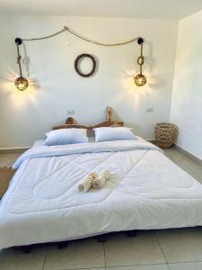 Postel nebo postele na pokoji v ubytování Oro Guesthouse