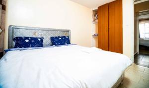 Postel nebo postele na pokoji v ubytování Lovely Sweet Home + 9 fotografií