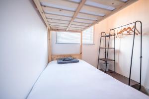 a bedroom with a bed in a room at Find peace in a chalet by the beach in Kessingland