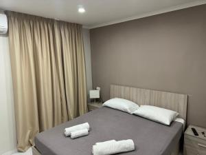 Posteľ alebo postele v izbe v ubytovaní Mignone Luxury House
