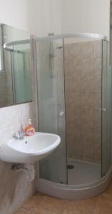 Kúpeľňa v ubytovaní White Ship Apartman