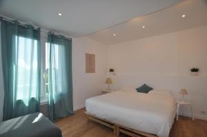 Voodi või voodid majutusasutuse L'Hirondelle - Charming flat - toas