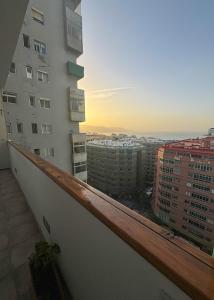 a view from the balcony of a building at Breathtaking Sunsets Flat in Las Palmas de Gran Canaria +15 photos