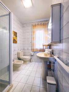 Koupelna v ubytování CityLoft Olbia + 31 fotografií