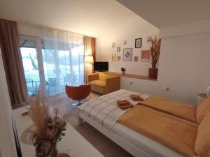 Postel nebo postele na pokoji v ubytování My Place Apartmani