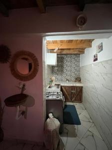 Kuchyň nebo kuchyňský kout v ubytování TAMRI BEACH HOUSE