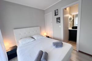 Posteľ alebo postele v izbe v ubytovaní Centre-ville 5mn Croisette