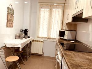 Dapur atau dapur kecil di Pequeño Hogar (Garaje gratis) +14 gambar