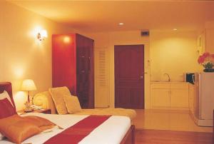 Cama o camas de una habitación en LK Pavilion Executive Serviced Apartment