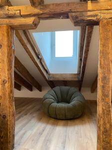 a room with a bean bag chair in the attic at Fomento by Wynwood House in Madrid