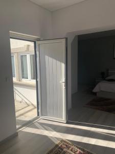 Un ou plusieurs lits dans un hébergement de l'établissement Casa da Moagem