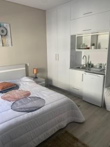 Un ou plusieurs lits dans un hébergement de l'établissement Casa da Moagem