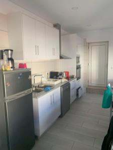 Cuisine ou kitchenette dans l'établissement Casa da Moagem