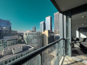 a balcony with a view of the city at 300 Front Suites - Two Beds with Free Parking in Toronto