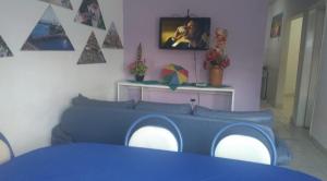 a room with a blue bed in a room at Hostel Brasil Recife in Recife
