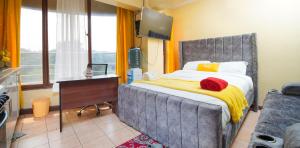 Ένα ή περισσότερα κρεβάτια σε δωμάτιο στο Supercilious Suite Apartment