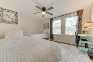 a bedroom with a bed and a ceiling fan at Quiet Vacation Rental in Peachtree City with Yard! in Peachtree City
