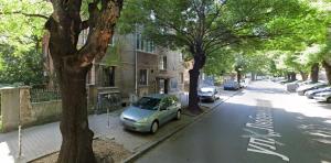 a small car parked on the side of a street at Top Center Relax, NDK & Vitoshka str, FREE Secured parking in Sofia