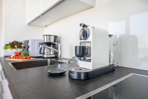Kuchyň nebo kuchyňský kout v ubytování Villa 15 - Penthouse Ankerplatz 2