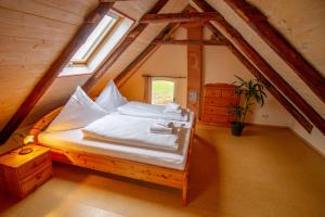 Postel nebo postele na pokoji v ubytování Ferienhaus Utkiek