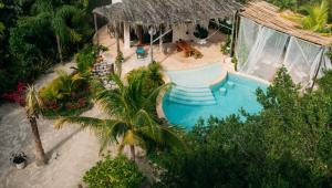 an aerial view of a swimming pool in a resort at H Boutique Casa Noma-Noma Holbox in Holbox Island
