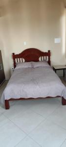 Ein Bett oder Betten in einem Zimmer der Unterkunft Cantinho do Jorge