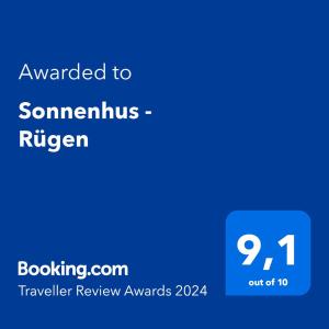 Un certificat, premiu, logo sau alt document afișat la Sonnenhus - Rügen