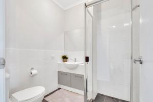 A bathroom at 96B Esplanade, Semaphore
