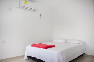 Postel nebo postele na pokoji v ubytování Apartamento en Valledupar - Casa Canaán