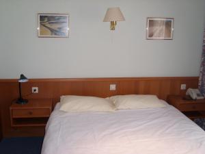 Letto o letti in una camera di Hotel de Foetz