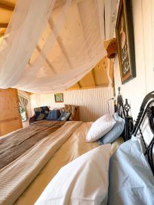 A bed or beds in a room at Live the bedouinlife